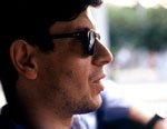 Who is Dimitris Houliarakis